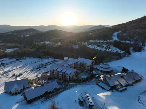 Aerial view of the Lincoln Peak base area during sunrise