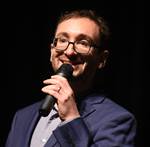 headshot of a comedian