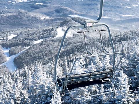 close up of empty heavens gate chair in winter