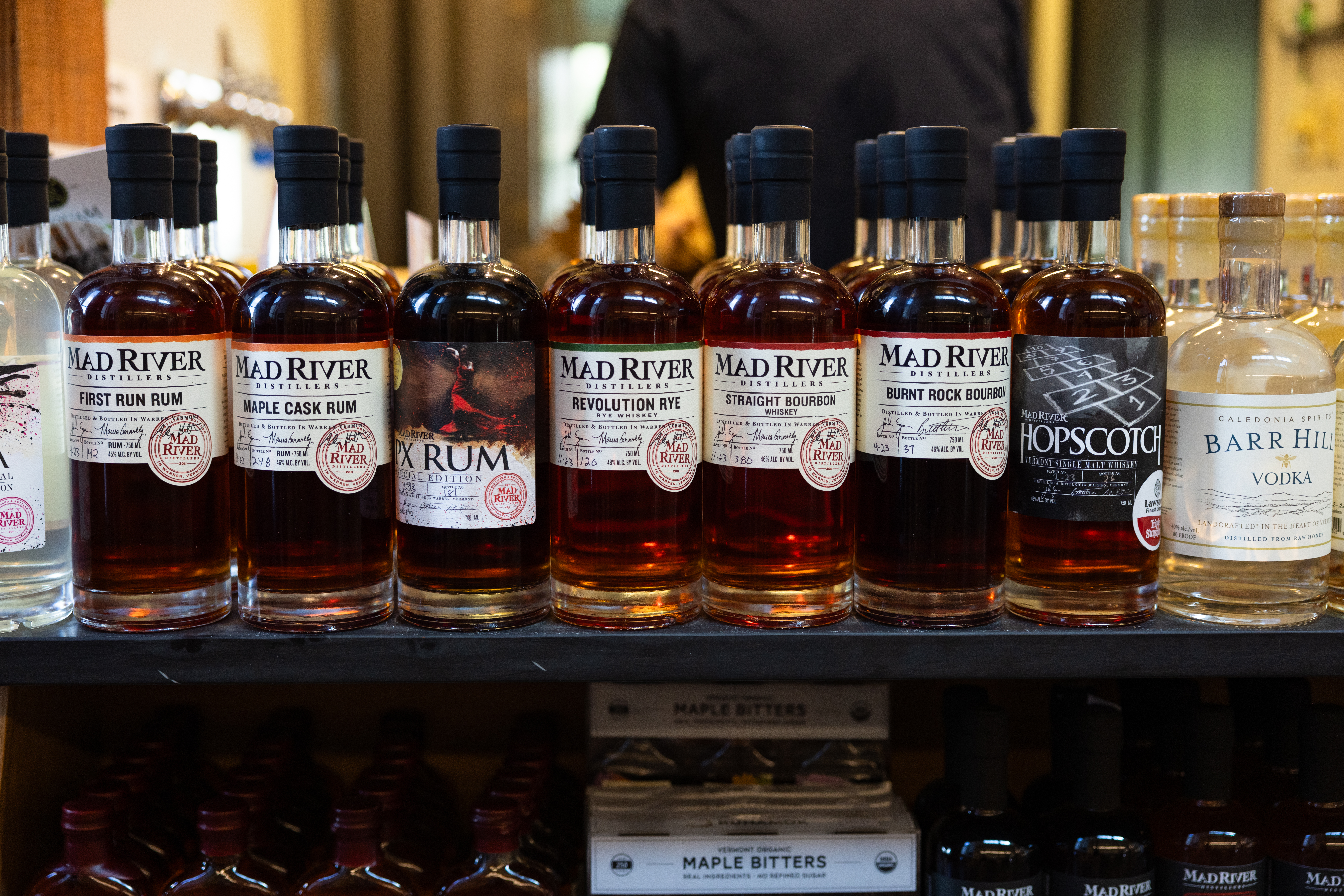 mad river distillers bottles lined up on a shelf