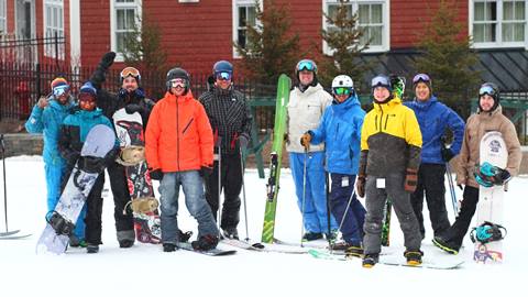 A group of skiers and riders 