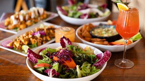 A salad and cocktail