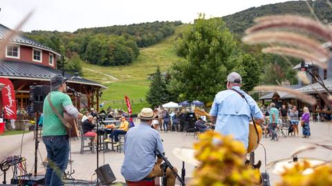 A band playing the fall in the Lincoln Peak courtyard