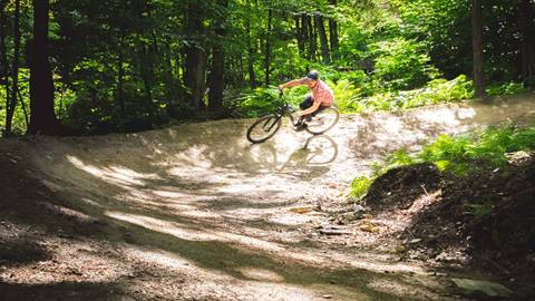 Biker on a flow track in the summer