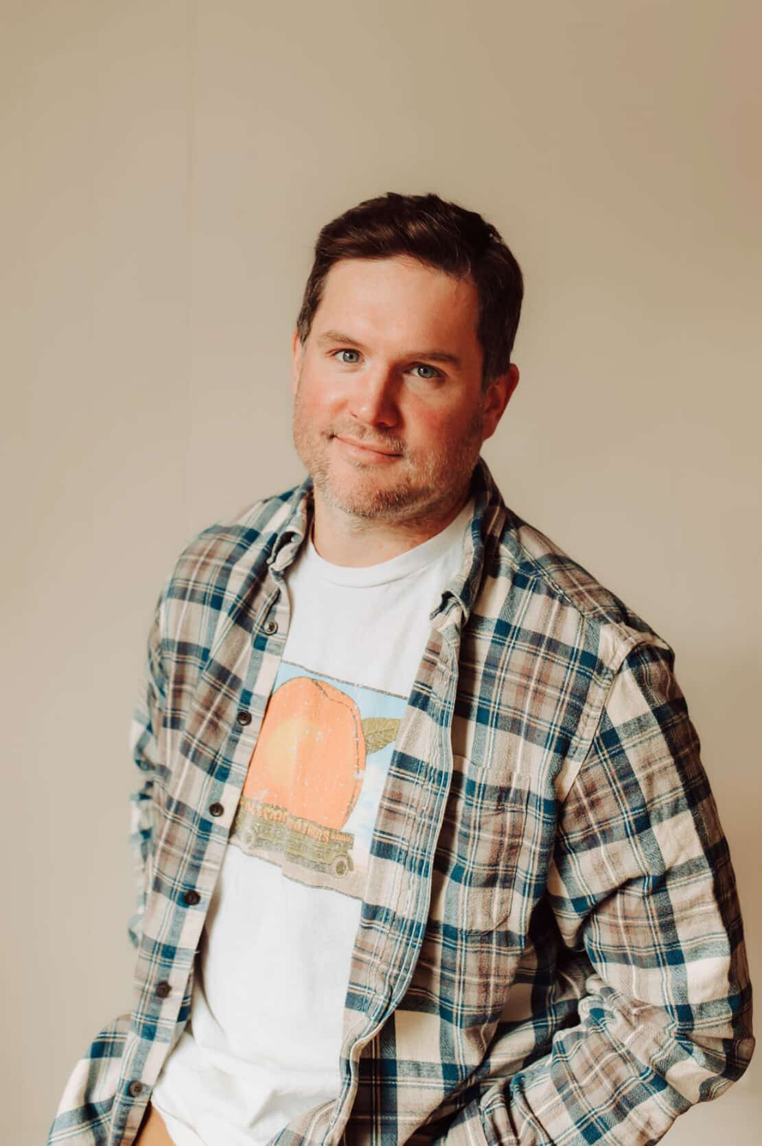 headshot of comedian zach