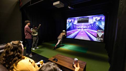 People playing in the SIM Suites 