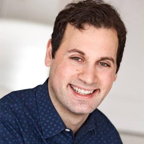 headshot of a comedian