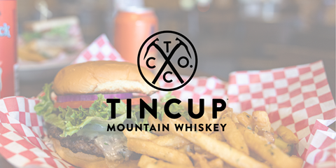 photo of a burger and fires with the tin cup logo overlayed