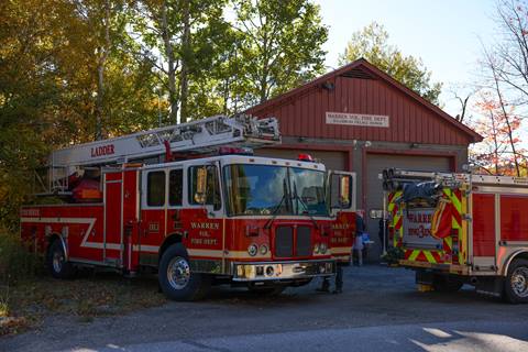 fire trucks in front of volunteer fire station