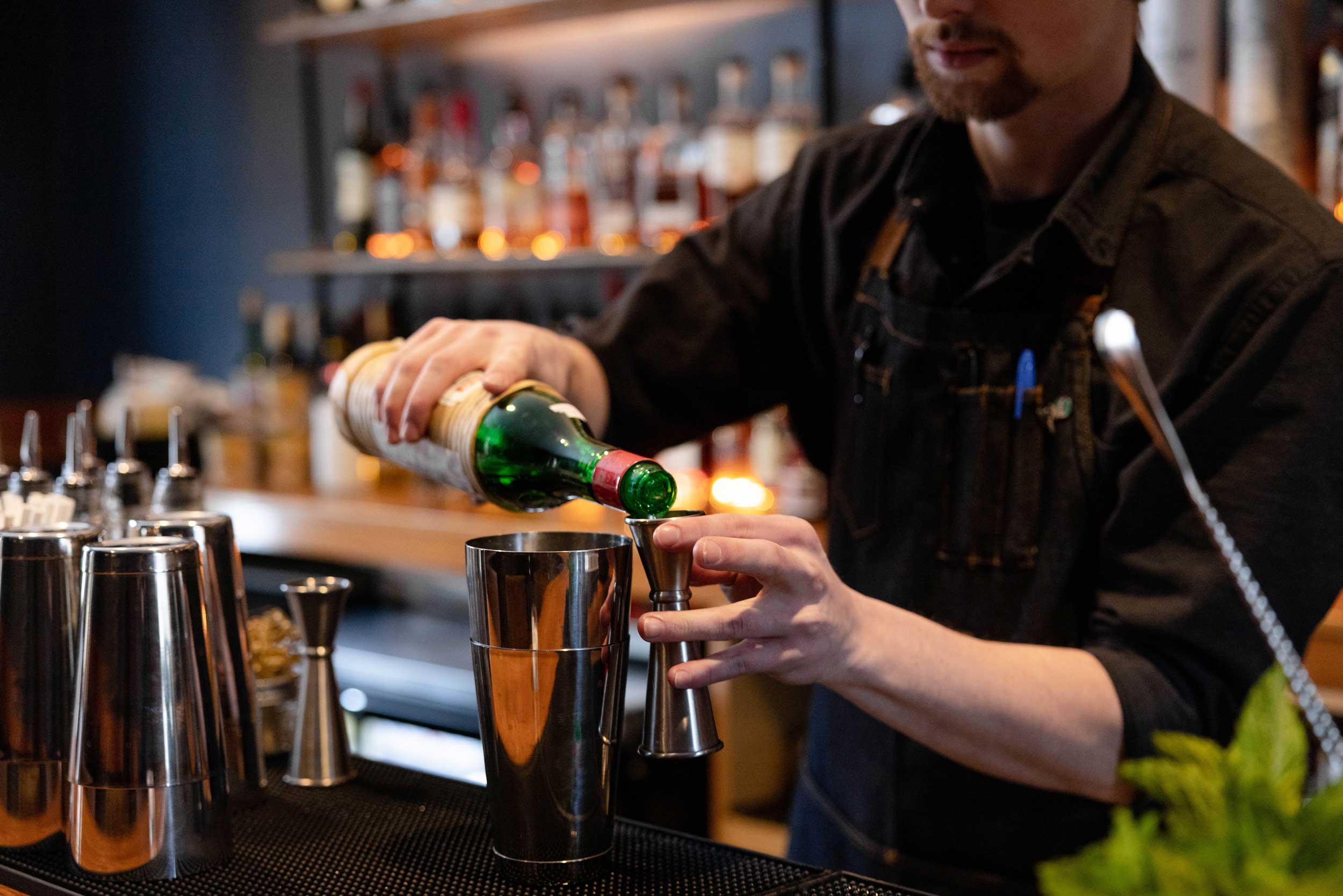Bartender making a craft cocktail at the new Sugarbush Happy Hour Lounge in Vermont