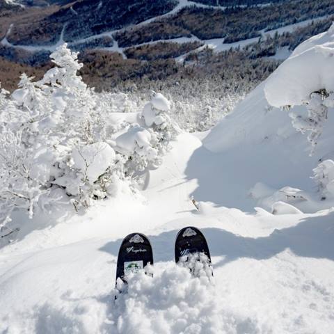 Ski tips over the church
