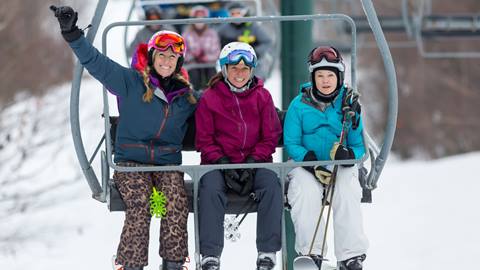 A group of women on North Lynx smiling at the camera