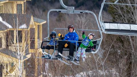 Micro Blazers with instructors on the chairlift