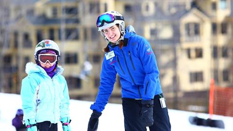 A young instructor with a child