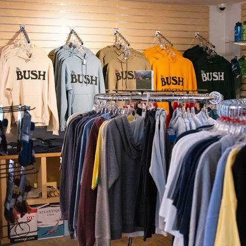 Sugarbush merch at Paradise Provisions, including sweatshirts that say The Bush