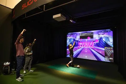 Sports simulator bowling with friends