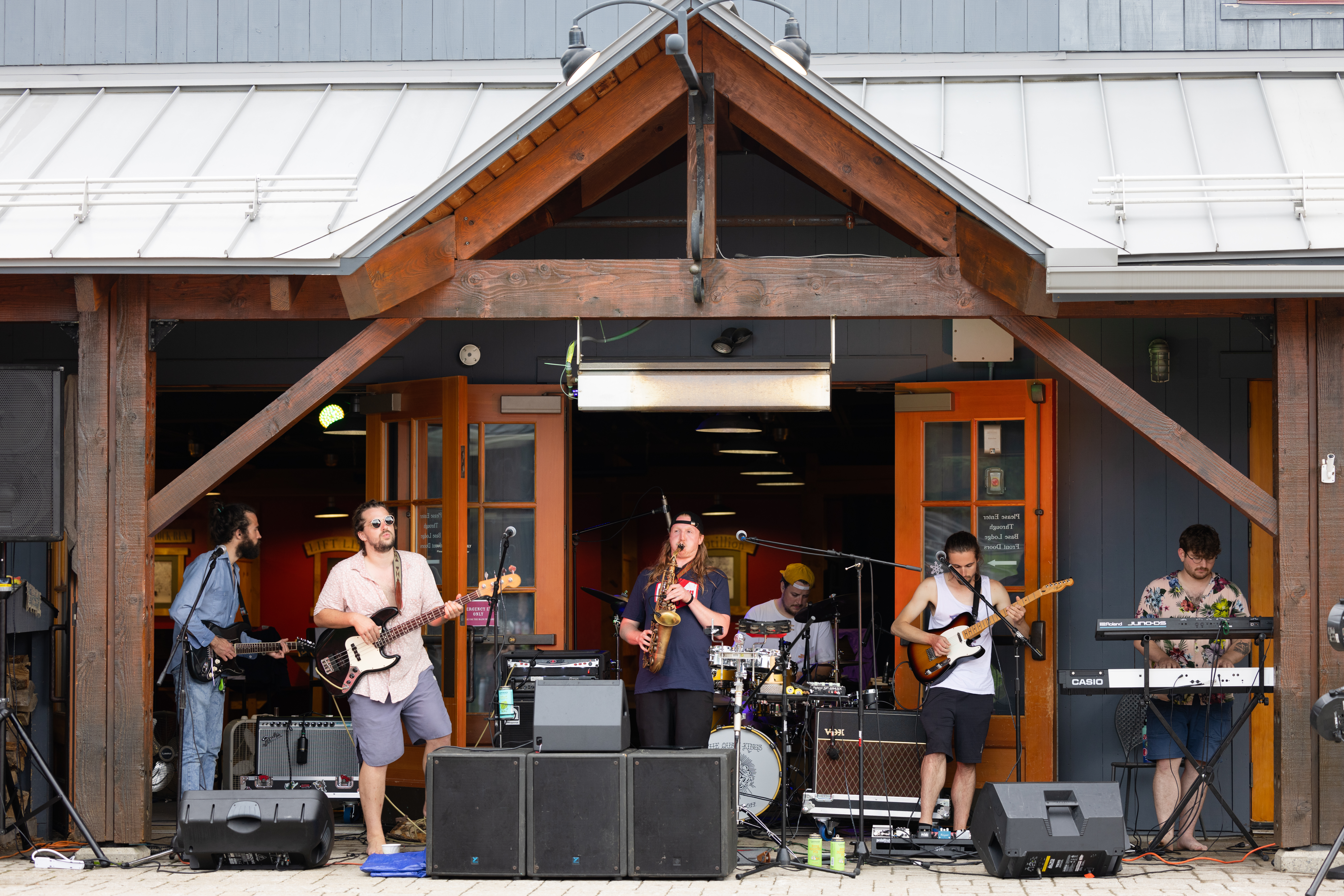 band playing outdoors in courtyard