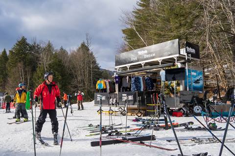 Skier near teton ski merch booth