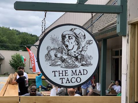 Close up of the Mad Taco sign in the mad river valley
