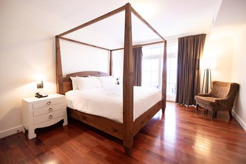 King size bed inside a Claybrook unit