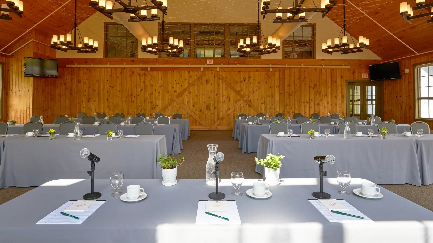 Conference presenters view of all the tables set up in Gate House Lodge