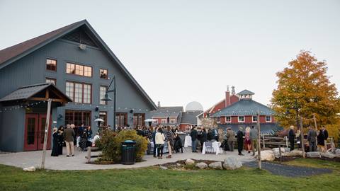 Group of people outside the Gate House Lodge on the patio