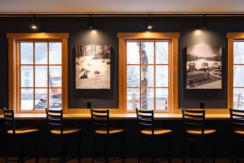 Tables and chairs set up in The Tucker at Sugarbush Resort