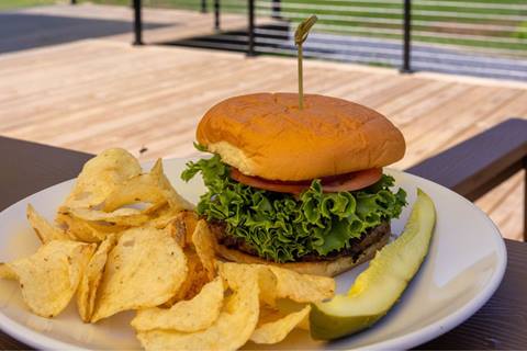 A burger and Chips at The Clubhouse