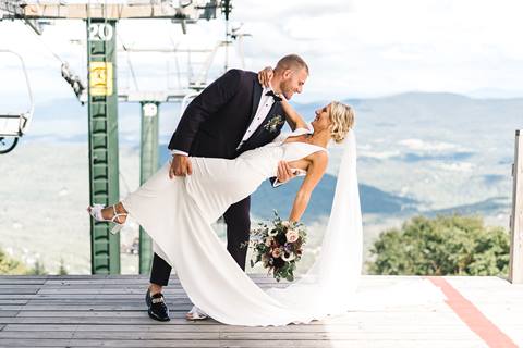 Formal Bride and Groom portrait in front of chairlift at the mountaintop 