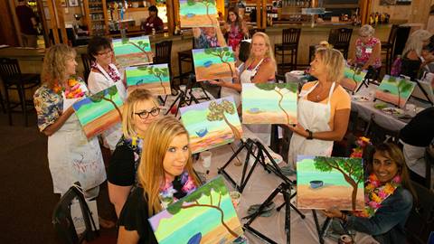 Group doing paint and sip in Rumble's