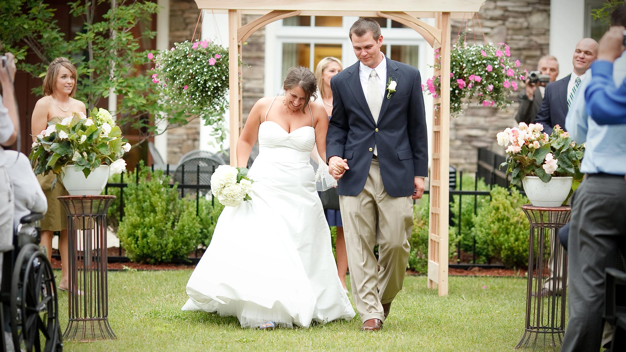 bride and groom walking down the aisle