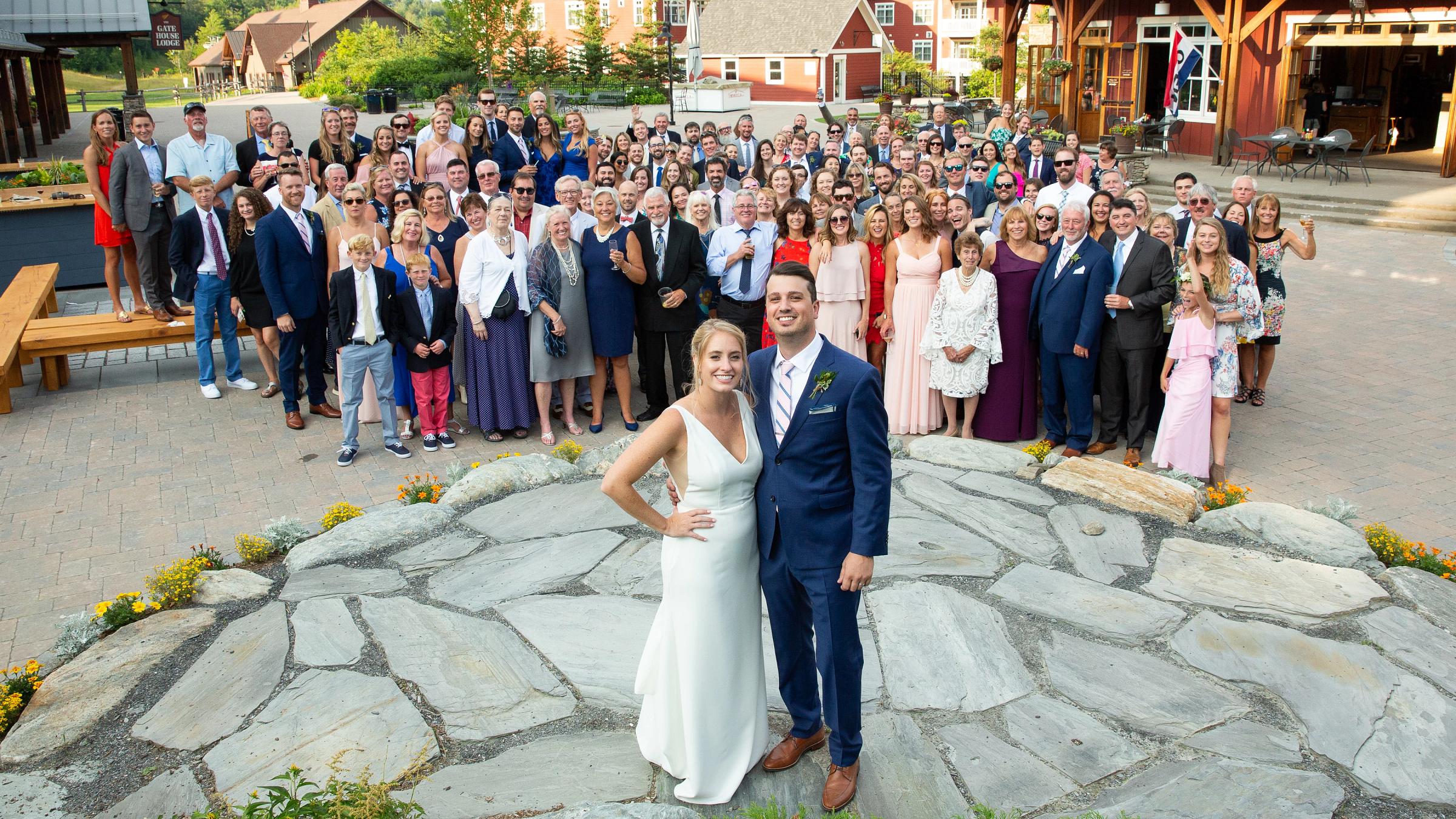 Bride and groom with entire wedding