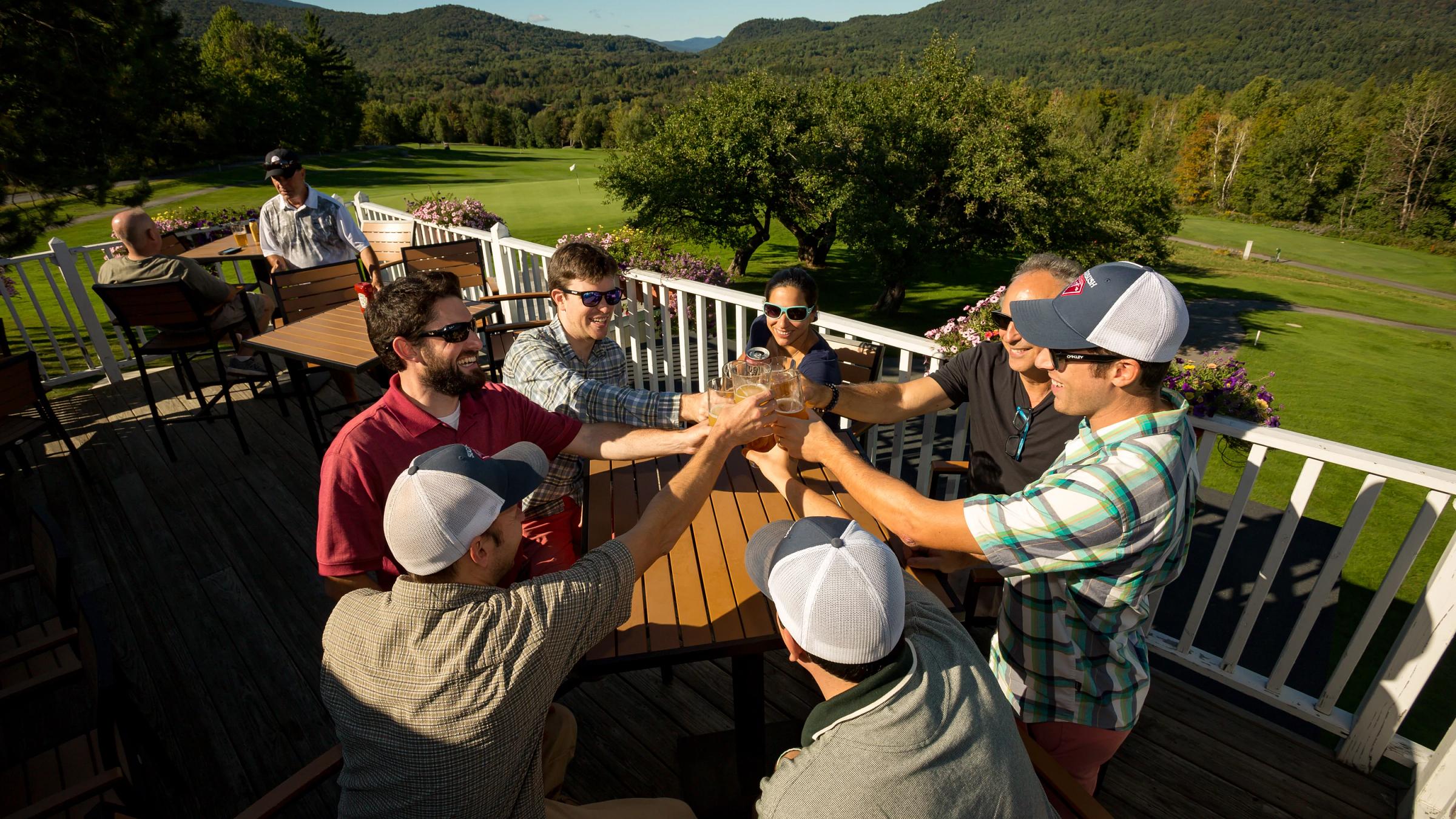 Friends celebrating on the Hogan's deck
