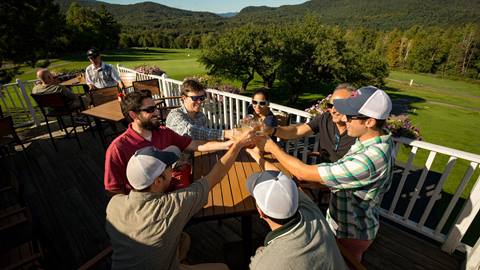 Friends celebrating on the Hogan's deck