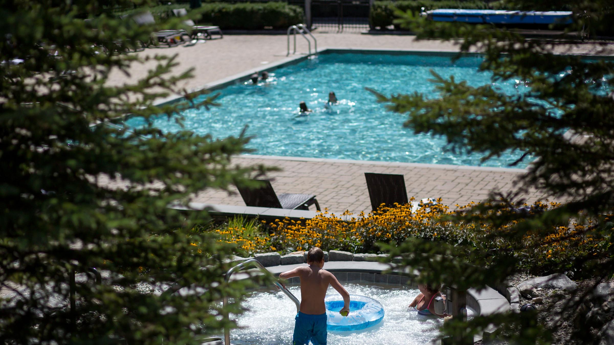 Child in Jacuzzi at Clay Brook
