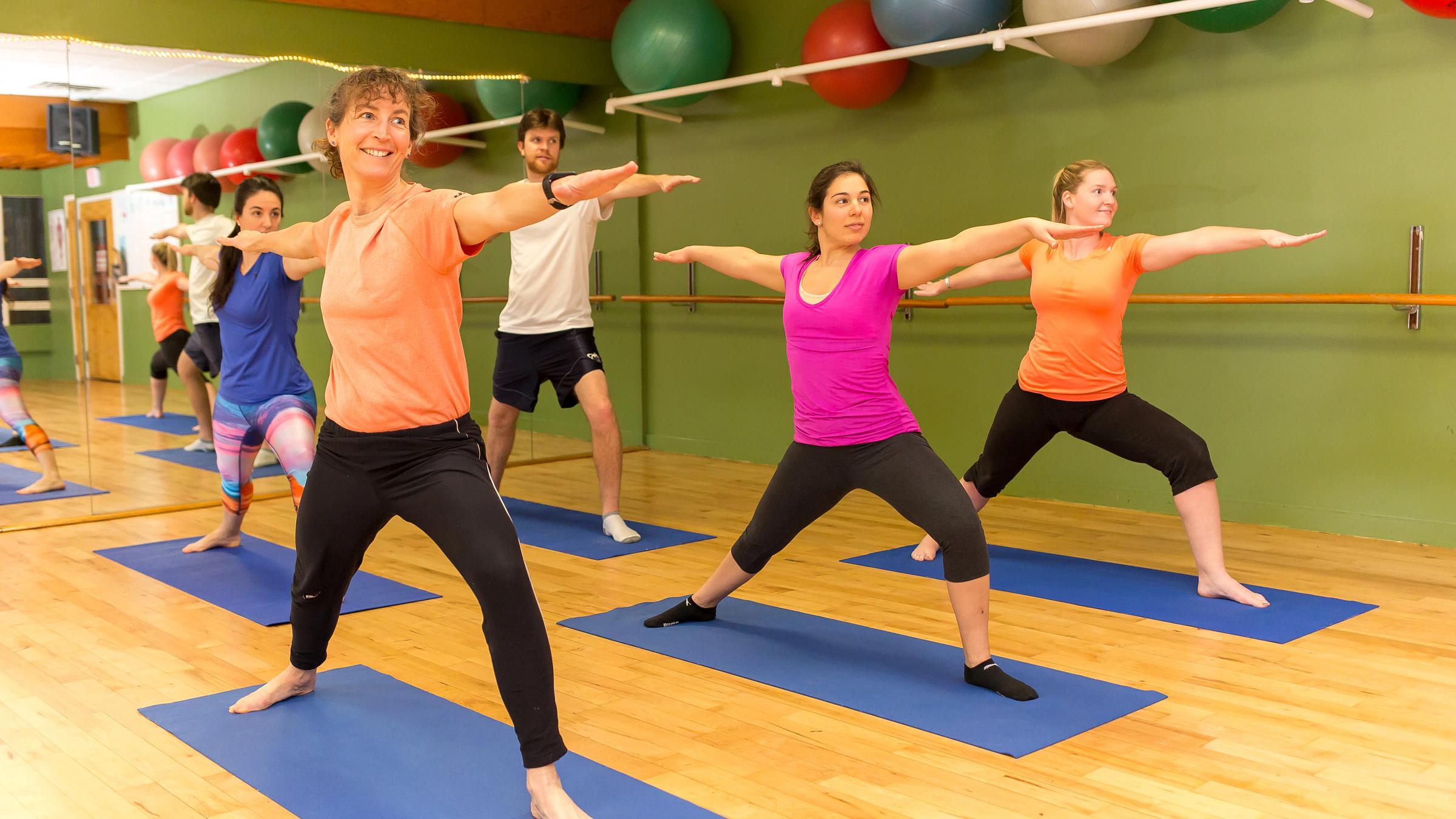 Group of adults doing yoga