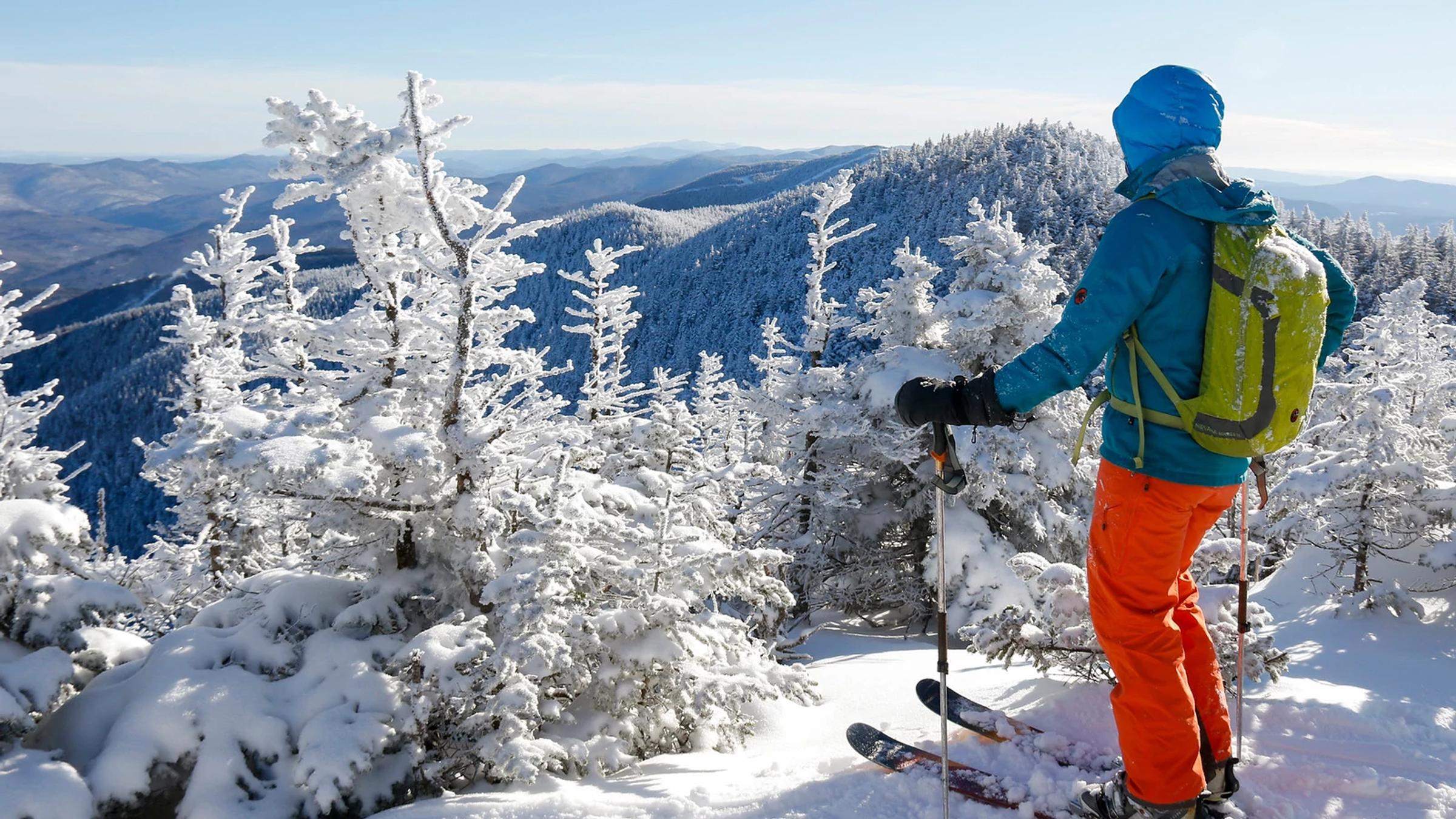 Summit Skier Orange Pants Scenic